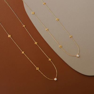 Golden Clover Necklace by CARRIE